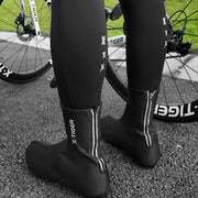Black ankle cycling shoe covers with front zipper and elastic opening, pair view